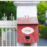 Plaques Painted on a Mailbox