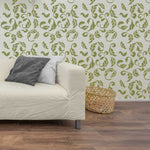 Acanthus Wall Stencils in living room in green with couch